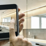 tenant taking a photo with his cell phone for a maintenance request