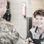 ISS employee serving a member of the Danish military