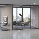 Three connected glass-fronted office spaces created by Tek Vue wall system