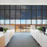 Mecho SolarTrac 4.0 window shades in an office space