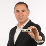 Amber CEO holds solid-state smart circuit breaker