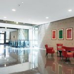 Armstrong's ACOUSTIBuilt Seamless Acoustical Ceiling system in a lobby