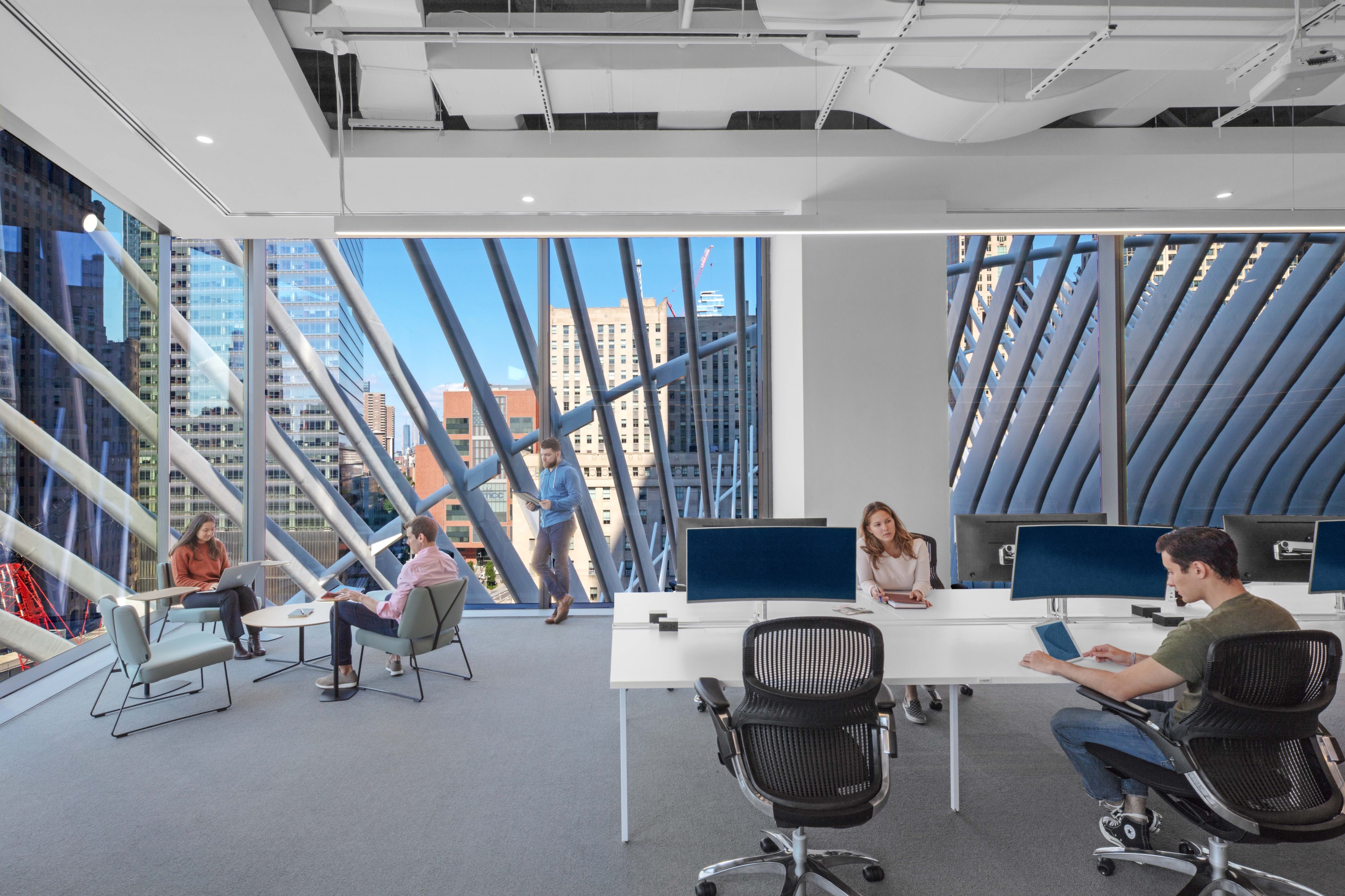 Figure 1: The WPP Campus at 3 World Trade Center houses 4,100 employees from eight different creative media agencies with a variety of workspaces and acoustic accommodations to meet worker needs. Credit Eric Laignel