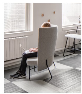 Figure 1. Consider how products can provide privacy while also communicating occupancy. This seat is providing some privacy for the user while also allowing others to know that the chair is occupied.