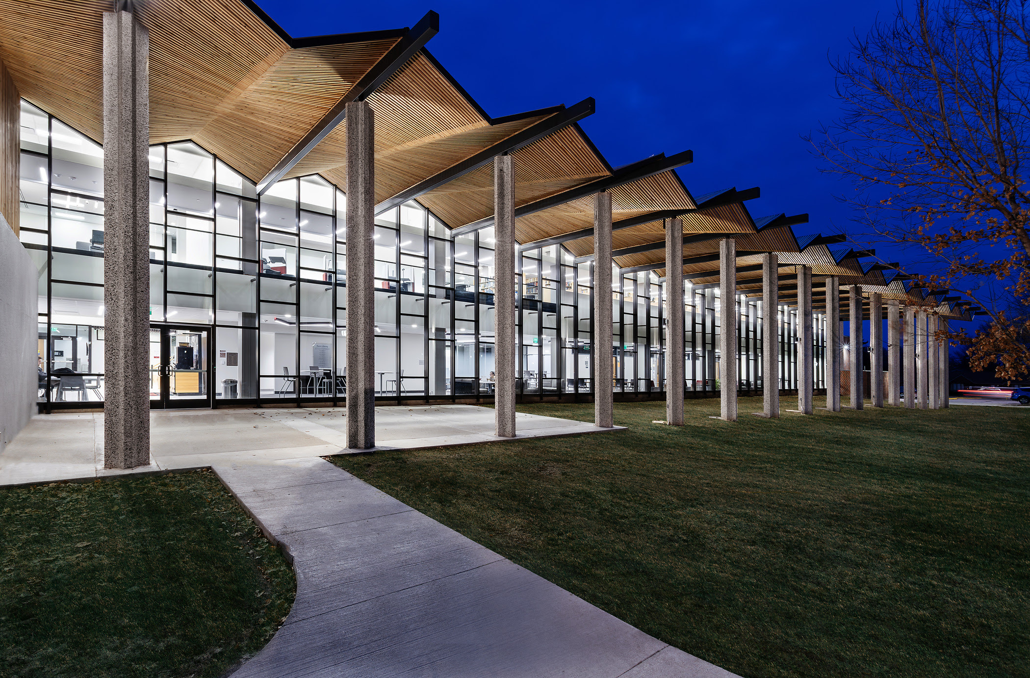 Exterior of Dunn Library at Simpson College, with angled overhang against deep blue sky