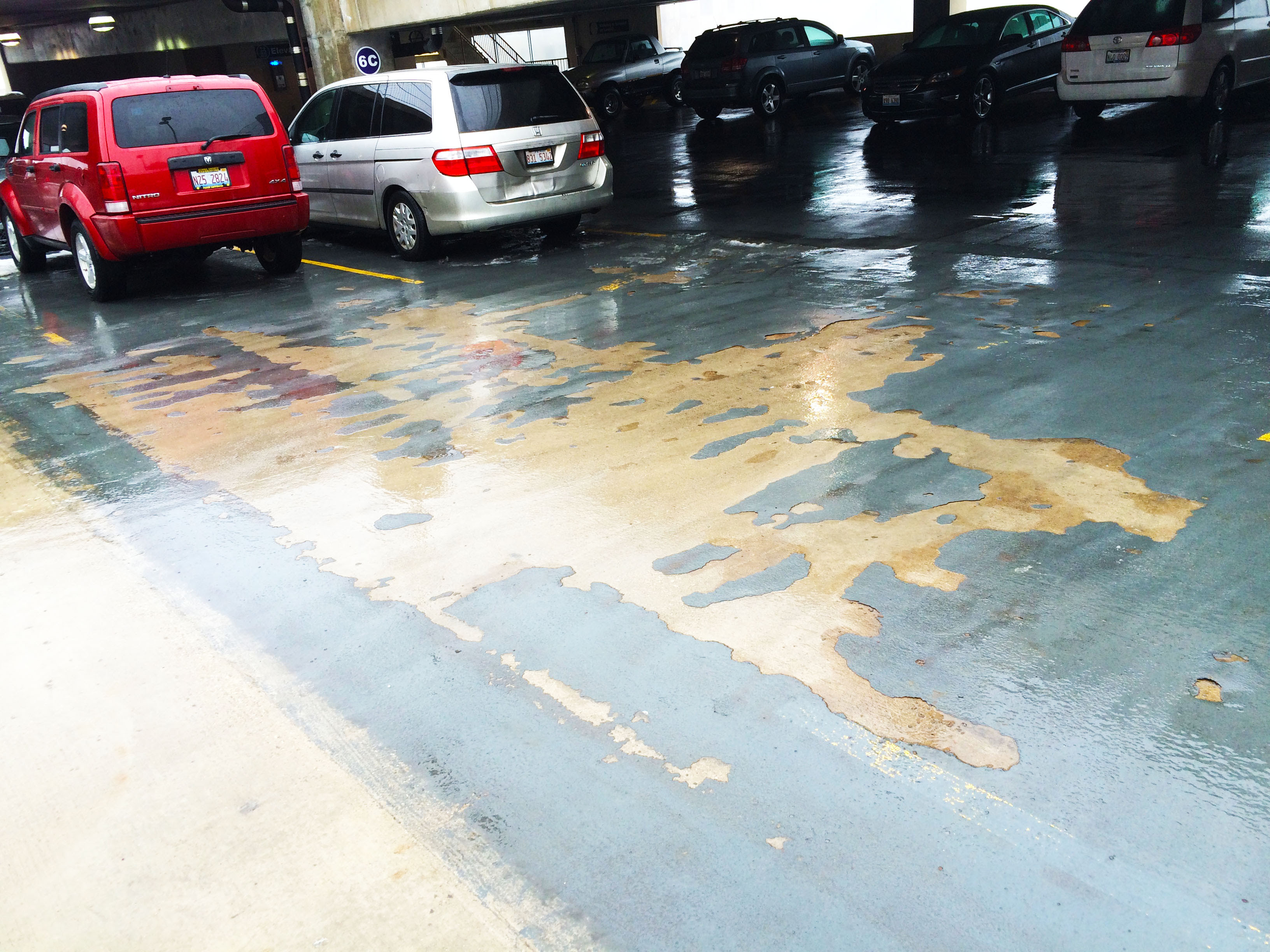 Damage to parking garage floor